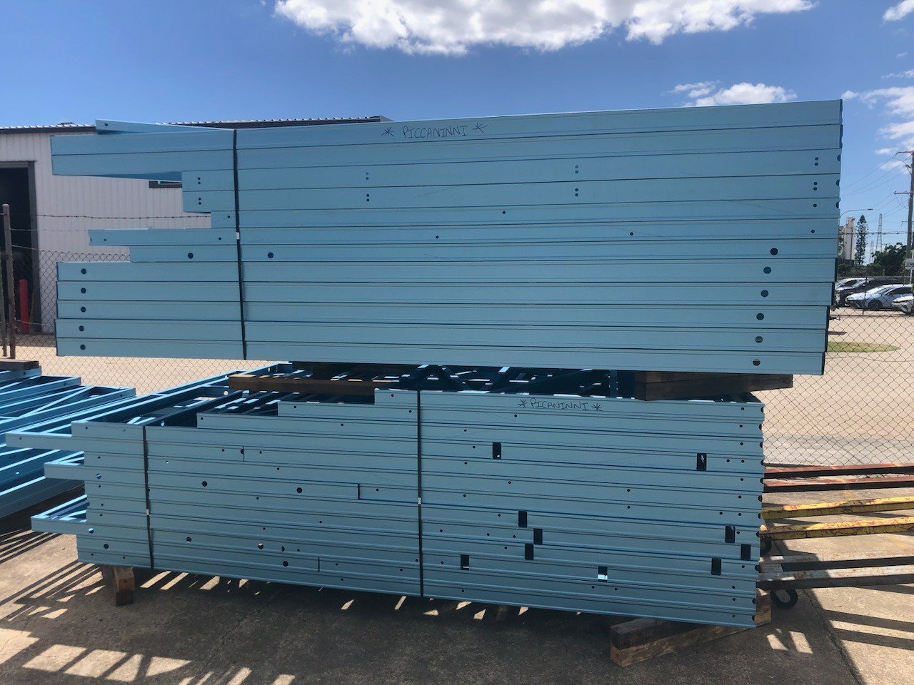 Prefabricated steel wall sections bundled for the Grevillea modular home