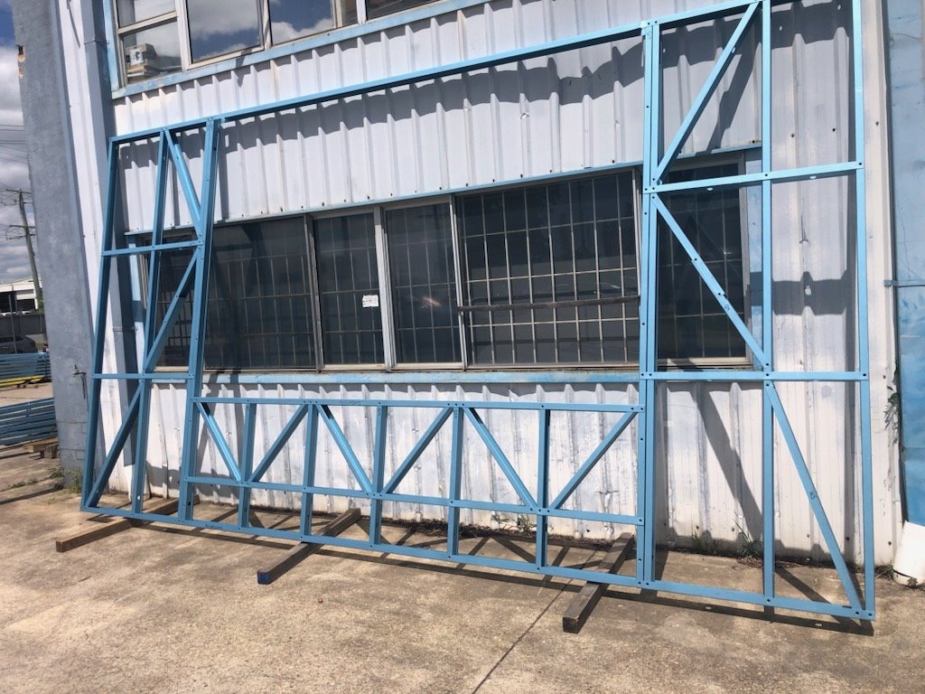 Completed light-gauge steel wall frame with openings and bracing