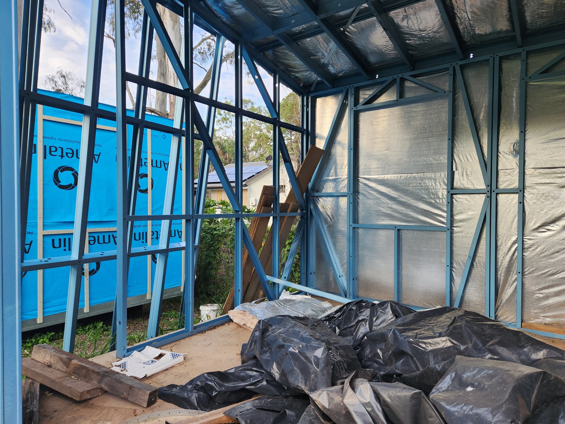 Interior steel framing and insulation in Module One