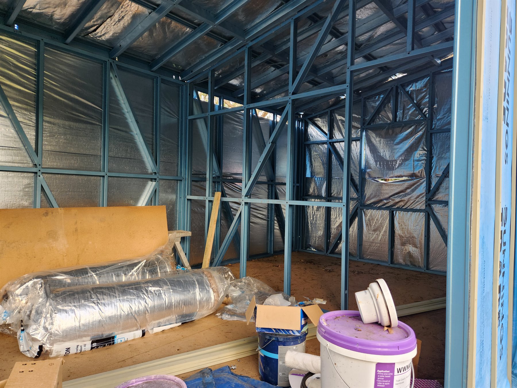 Interior view through the steel room divisions of Module One