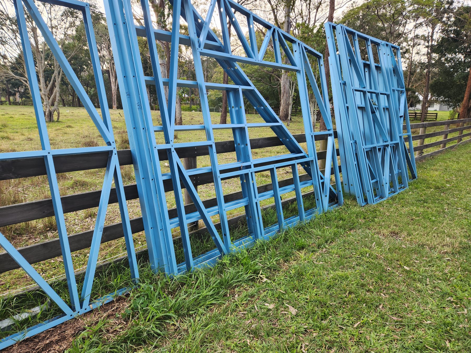 Grevillea steel wall frames staged before installation